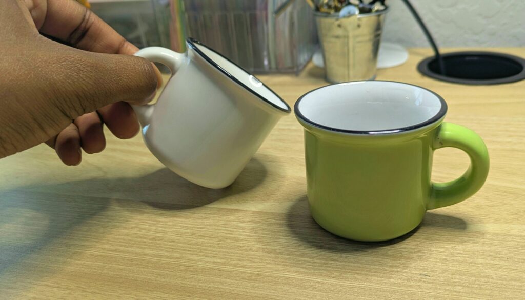 My two very tiny water cups that look like tiny coffee mugs